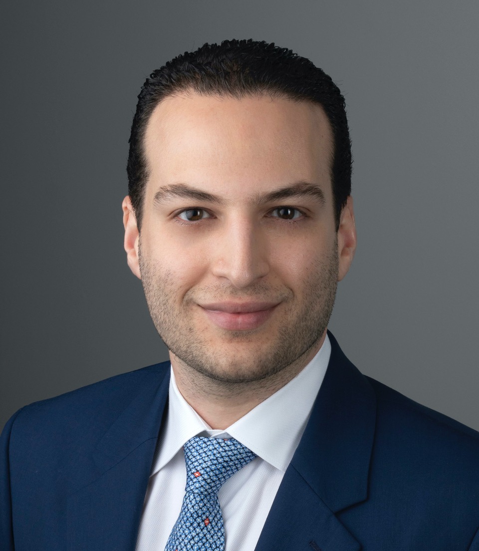 Headshot of man with clear skin and lots of hair